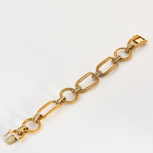 Bracelet Bracelet or jaune et blanc, maille tréssée 58 Facettes SEN2059