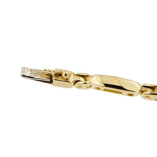 Bracelet segmenté en or jaune orné de saphirs et de diamants