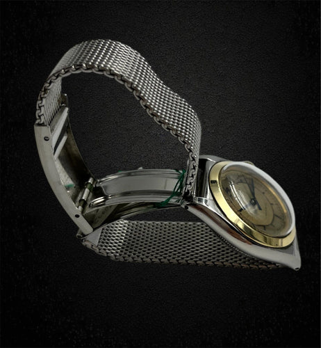 Montre Rolex « Ovetto » réf. 3133, or et acier 58 Facettes