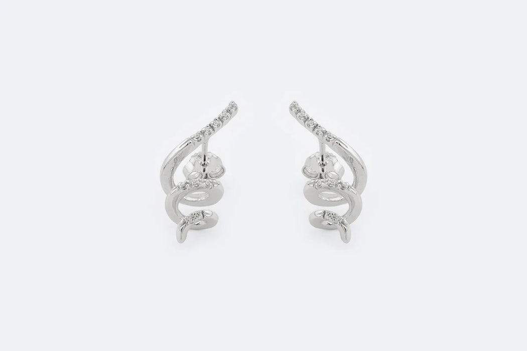 Boucles d'oreilles spirales en or blanc et diamants