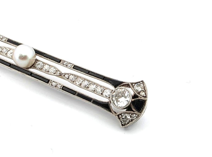 Broche Broche Art Déco des années 1920 en platine, ornée de diamants et d'une perle centrale 58 Facettes
