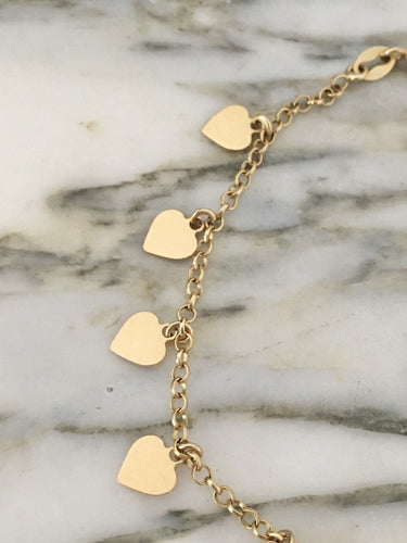 Bracelet cœurs en or jaune 18k