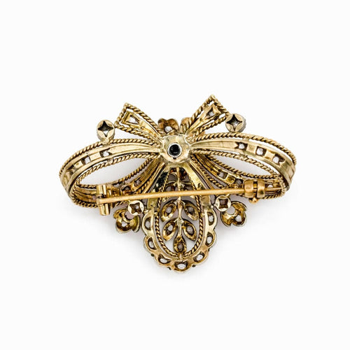 Broche Broche au design vintage, en or jaune, argent et diamants. 58 Facettes 50143