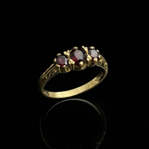Bague Bague anglaise « Trilogie » avec grenat pyrope 58 Facettes