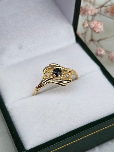 Bague 54 Bague or jaune, saphir, diamants 58 Facettes 521