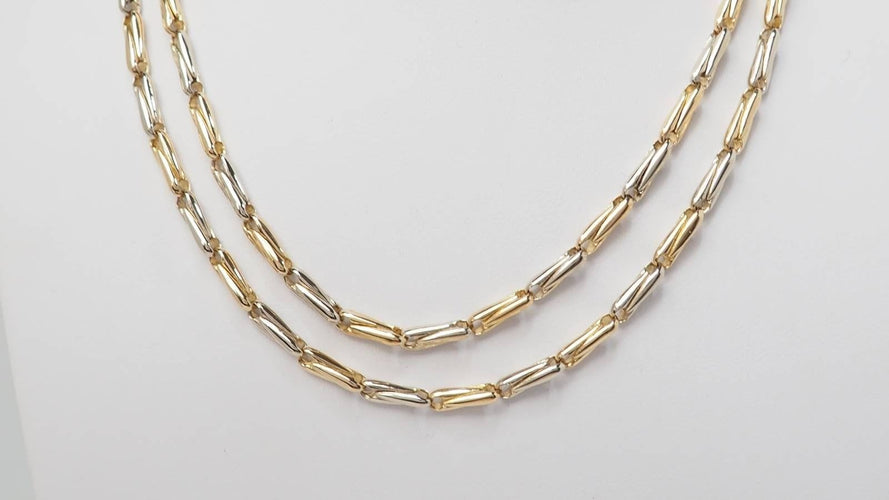 Collier Collier Sautoir Cartier en or jaune grain d' avoine 58 Facettes 32383