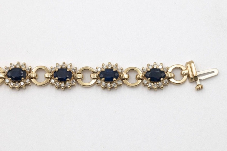 Bracelet Bracelet exclusif en or jaune 14k avec saphirs et diamants 58 Facettes 11393