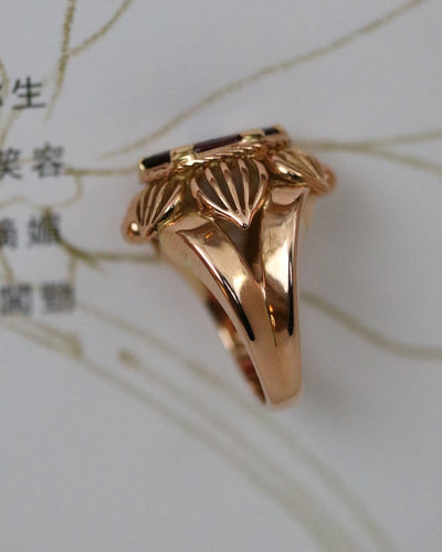 Bague 50 Bague Dôme Fleur Or Jaune et Grenat 58 Facettes A11212