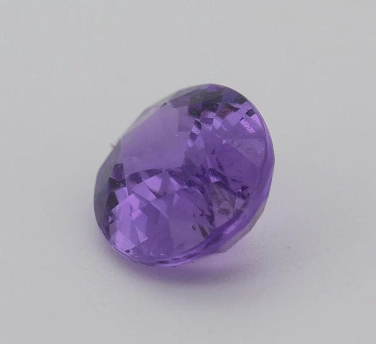 Gemstone Saphir violet non chauffé non traité 1.60cts 58 Facettes 440