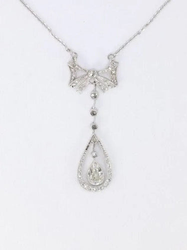 Collier noeud Belle Epoque or blanc diamant poire taille ancienne