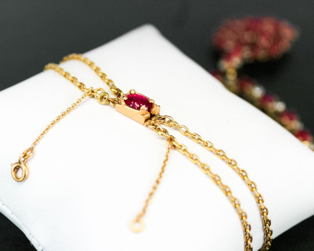 Collier Collier or jaune, cabochon rubis et diamants 58 Facettes 240040