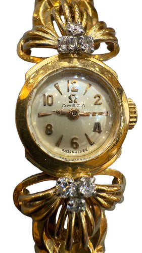 Montre Montre Omega ancienne en or  18 carats et diamants 58 Facettes