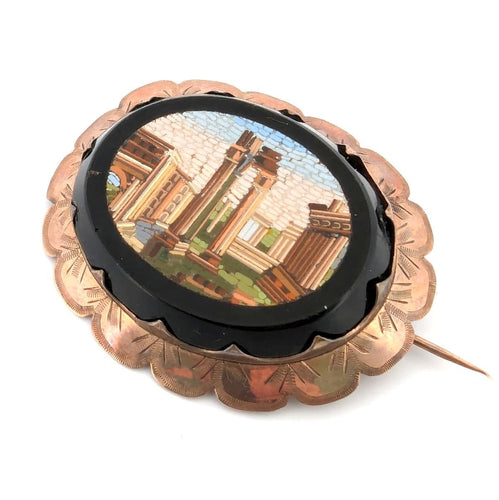 Broche Broche ancienne en or jaune avec micromosaïque d'onyx 58 Facettes