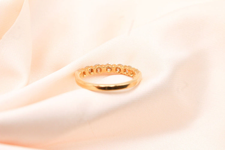 Bague Bague demi-alliance or jaune 7 diamants baguette 0,60 ct 58 Facettes 240240