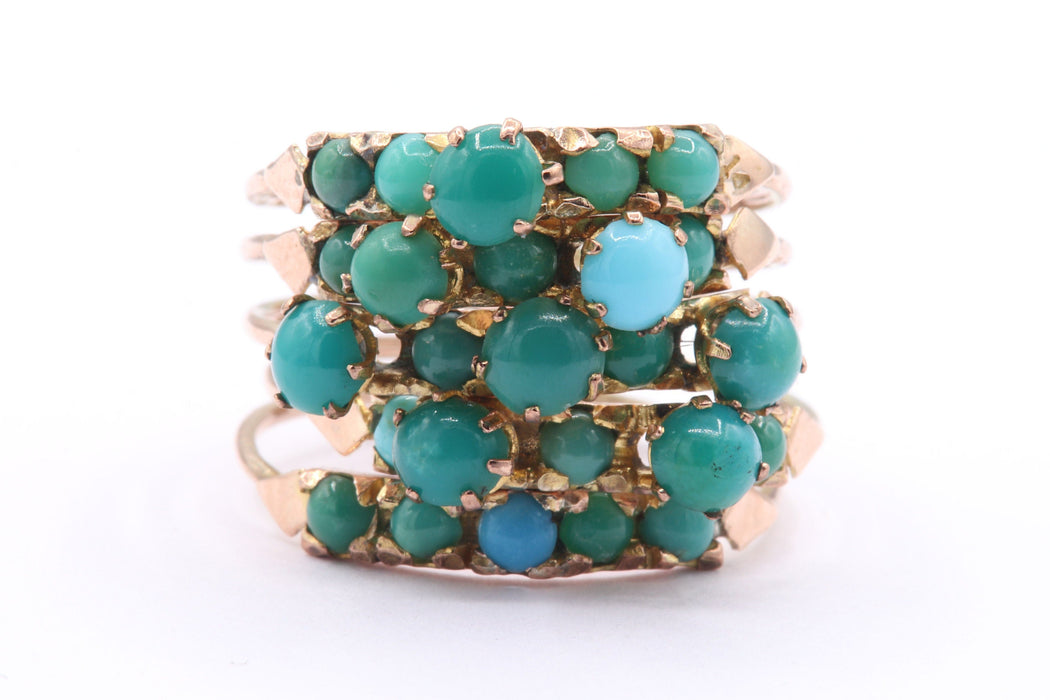 Bague 57 Bague multi-anneaux en or jaune sertie de turquoises 58 Facettes B398