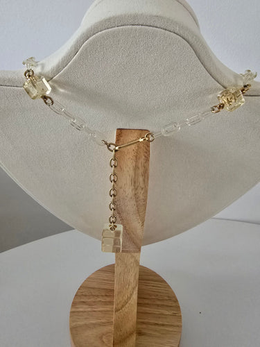 Collier Chanel - Collier Ice Cube vintage en métal doré et résine 58 Facettes