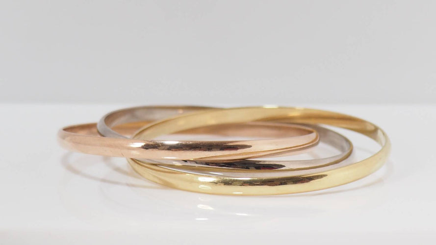 Bracelet Trinity de Cartier d'occasion trois ors 58 Facettes 31245