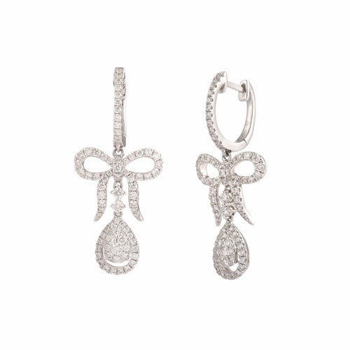 Boucles d’oreilles dormeuses nœuds pavés de diamants en or gris 18 carats 58 Facettes BO254