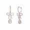Boucles d’oreilles dormeuses nœuds pavés de diamants en or gris 18 carats 58 Facettes BO254