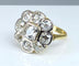Bague Importante bague marguerite en or 18 carats et diamants 58 Facettes AB338