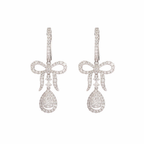 Boucles d’oreilles dormeuses nœuds pavés de diamants en or gris 18 carats 58 Facettes BO254