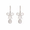 Boucles d’oreilles dormeuses nœuds pavés de diamants en or gris 18 carats 58 Facettes BO254