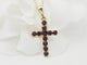 Collier Collier pendentif croix en or jaune et grenats 58 Facettes 33126