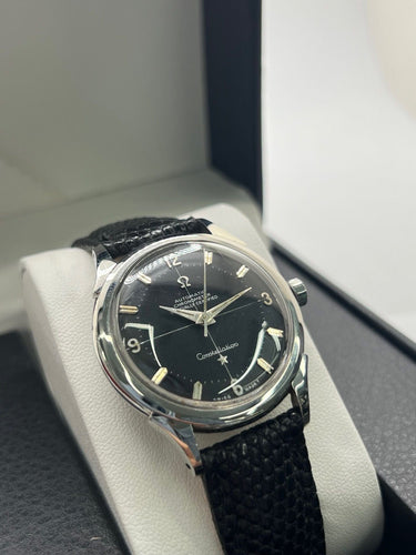 Montre Omega - Montre Constellation automatique acier cadran noir 35 mm réf. 2852 58 Facettes