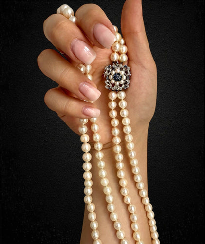 Collier Magnifique collier de perles à double rang 58 Facettes