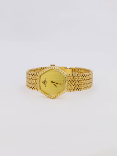 Montre BAUME & MERCIER Montre vintage or jaune maille tressée 58 Facettes 1067.3