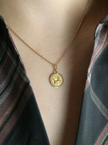 Pendentif PERROUD Pendentif vintage signe du Capricorne or jaune 58 Facettes 1094.3