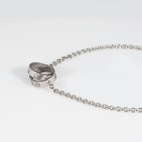 Bracelet Bracelet Cartier Entrelacs Love COA Estate en or blanc 18 carats doublement signé 58 Facettes G13653