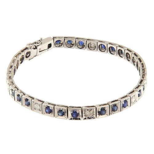 Bracelet Bracelet tennis en or blanc avec saphirs et diamants 58 Facettes G3816