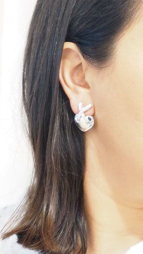 Boucles d'oreilles Boucles d'oreilles CHAUMET Liens en or blanc et diamants 58 Facettes 32735