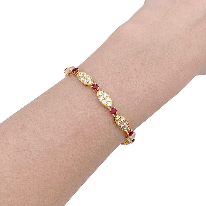 Bracelet Bracelet vintage Van Cleef & Arpels, diamants, rubis, or jaune. 58 Facettes 33758