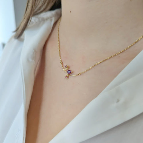 Collier Collier en or jaune  et rubis 58 Facettes 32891