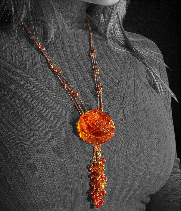 Collier Collier multirangs avec imposant pendentif en ambre 58 Facettes