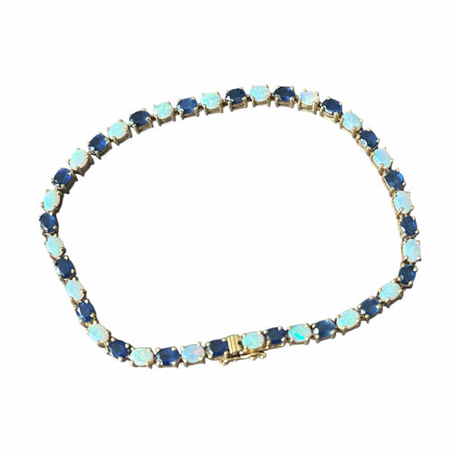 Bracelet Bracelet or jaune serti de saphirs et opales 58 Facettes 344