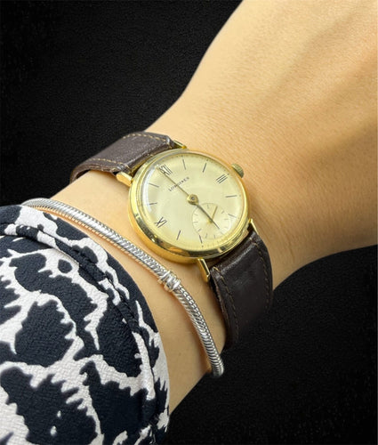 Montre-bracelet Longines Vintage en or jaune 18 carats