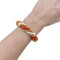 Bracelet Bracelet Van Cleef & Arpels, "Twist", or jaune, corail, perles. 58 Facettes 34875