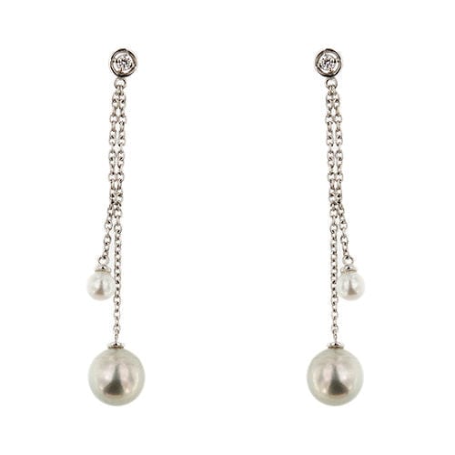 Boucles d'oreilles pendantes en perles et diamants