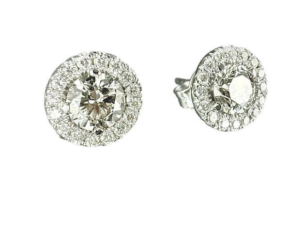 Boucles d'oreilles Paire de boucles or blanc, deux diamants 0.51 et 0.55 carat 58 Facettes