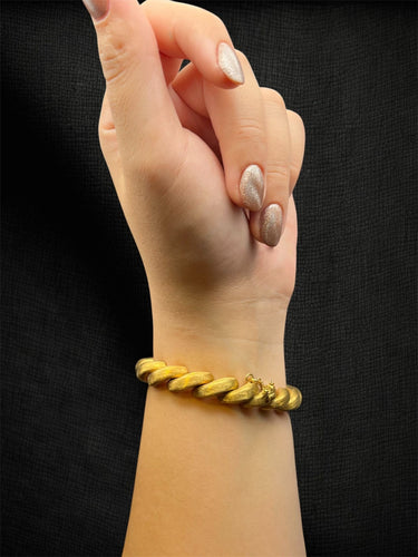 Bracelet Bracelet tressé plaqué or 18 carats 58 Facettes