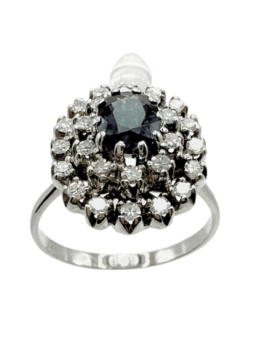 Bague 58 Bague en or blanc sertie d'un saphir bleu foncé et d'un halo de diamants. 58 Facettes 50354