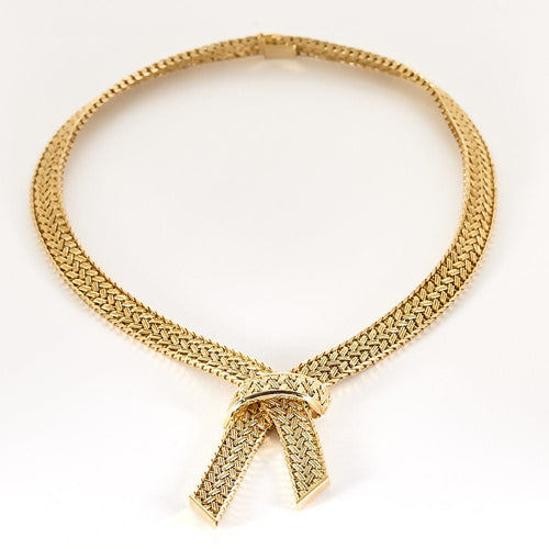 Collier Collier négligé en or jaune tressé 58 Facettes MON0828