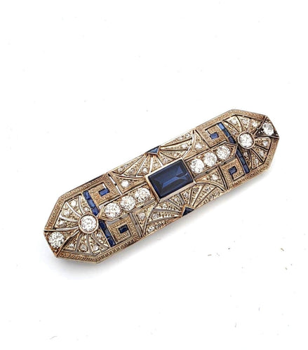 Broche Broche des années 1940 en or blanc 18 carats, saphirs et diamants 58 Facettes