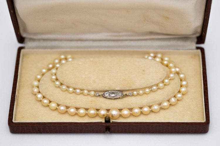 Collier Collier ancien en perles, fermoir en or jaune et platine et diamants 58 Facettes 10271