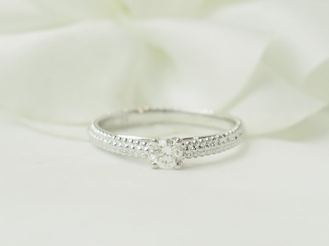 Bague 54 Bague solitaire Mauboussin "Fan du premier jour" en or blanc et diamant 58 Facettes 33608