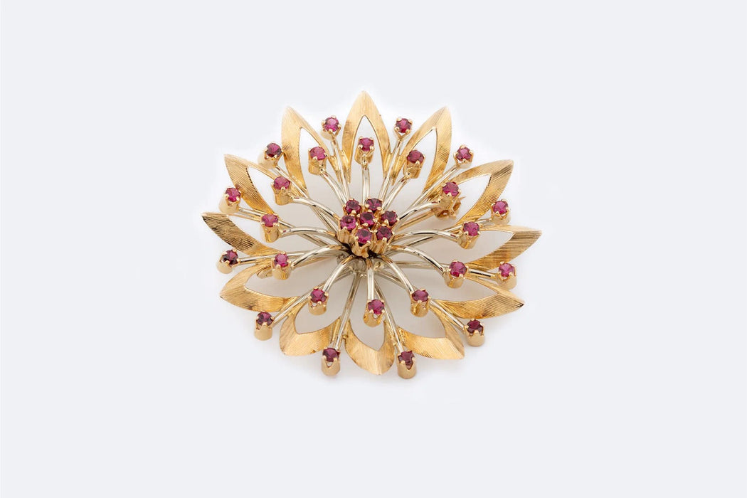 Broche Broche fleur en or jaune avec rubis 58 Facettes SPL94