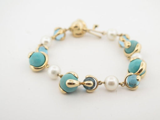 MARINA B cardan bracelet yellow gold and turquoise stones 58 Facettes 259151